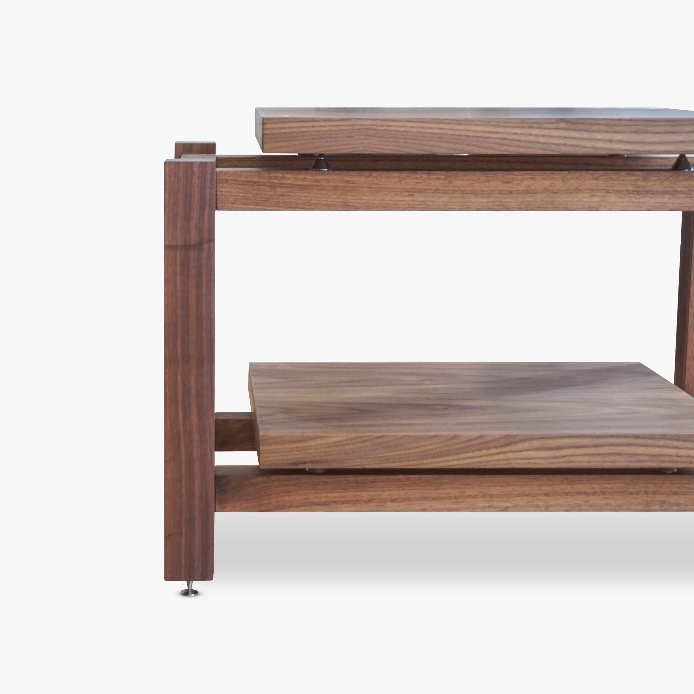 The Kunsst walnut turntable stand with two audio isolation platforms, designed to isolate your turntable and support a hi-fi amplifier, standing on a white background.