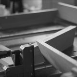 Close-up of a kunsst desk manufacturing proces on a workshop table